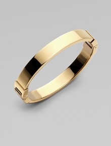 A thin goldtone design with hinge closure, perfect for stacking. Goldtone steelDiameter, about 2¾Hinged closureImported A thin goldtone design with hinge closure, perfect for stacking. Goldtone steelDiameter, about 2¾Hinged closureImported
