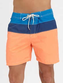 A summer essential for the beach, poolside and beyond set in colorblocked nylon for a crisp, contemporary finish.Drawstring waistSide slash, back welt pocketInseam, about 565% cotton/35% nylonMachine washImported A summer essential for the beach, poolside and beyond set in colorblocked nylon for a crisp, contemporary finish.Drawstring waistSide slash, back welt pocketInseam, about 565% cotton/35% nylonMachine washImported