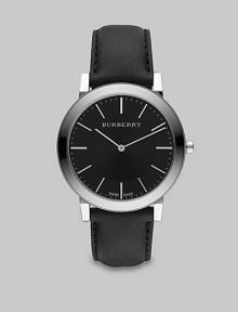 A super-slim black dial with sapphire crystal detail on a smooth leather strap. Round bezel Quartz movement Water resistant to 3 ATM Stainless steel case: 40mm (1.57) Leather strap: 20mm (0.79) Made in Switzerland A super-slim black dial with sapphire crystal detail on a smooth leather strap. Round bezel Quartz movement Water resistant to 3 ATM Stainless steel case: 40mm (1.57) Leather strap: 20mm (0.79) Made in Switzerland