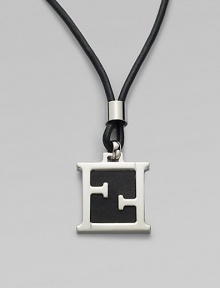 Leather cord necklace is accented by an iconic initial pendant of metal and leather.Metal/leatherAbout 1¼ x ½Necklace, about 23 longMade in Italy Leather cord necklace is accented by an iconic initial pendant of metal and leather.Metal/leatherAbout 1¼ x ½Necklace, about 23 longMade in Italy