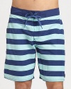 Stay stylish in the sun, the sand and beyond in these striped board shorts shaped in lightweight, breathable cotton.Drawstring tie waistSide welt pocketInseam, about 8NylonMachine washImported