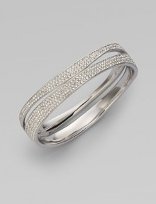 EXCLUSIVELY AT SAKS.COM. Curvaceous rows of pavé crystals decorate the wrist.Crystals Rhodium plated Width, about ¾ Diameter, about 2½ Push lock closure Imported EXCLUSIVELY AT SAKS.COM. Curvaceous rows of pavé crystals decorate the wrist.Crystals Rhodium plated Width, about ¾ Diameter, about 2½ Push lock closure Imported
