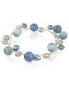 Cool, calm and collected. This serene bracelet features dyed-blue agate (31-1/2 ct. t.w.) and cultured freshwater pearls (6-7 mm). Set in sterling silver. Approximate length: 7-1/2 inches.