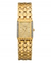 Intricate links and gleaming crystal stun on this dress watch by Caravelle by Bulova. Gold tone mixed metal bracelet and rectangular case crystallized with 24 hand-set elements at left and right. Gold tone sunray dial features stick indices, three gold tone hands and logo. Quartz movement. Water resistant to 30 meters. Two-year limited warranty.