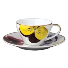 Pensees after dinner cup by Bernardaud. This lively, luxurious collection is sure to transform your table into a celebration of spring. The floral watercolor pattern features delicate, multicolored pansies that appear to be strewn across the surface of each piece. Pensees after dinner cup by Bernardaud. This lively, luxurious collection is sure to transform your table into a celebration of spring. The floral watercolor pattern features delicate, multicolored pansies that appear to be strewn across the surface of each piece.