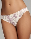 An ultra soft floral print bikini with lace accents at hips for a flattering style.