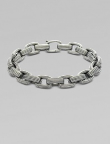 A handsome linked design, intricately textured in sterling silver. From the Royal Cord Collection Sterling silver Clasp closure About 8½ long Imported A handsome linked design, intricately textured in sterling silver. From the Royal Cord Collection Sterling silver Clasp closure About 8½ long Imported