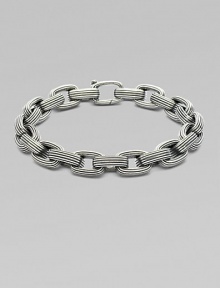 A handsome linked design, intricately textured in sterling silver. From the Royal Cord Collection Sterling silver Clasp closure About 8½ long Imported 