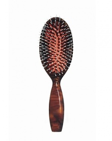 The Classic Brush leaves the hair shiny and static-free, its natural boar bristles protect the hair and stimulate the scalp. The Classic Brush is handcrafted in France from faux tortoise and natural boar bristles. The Classic Brush leaves the hair shiny and static-free, its natural boar bristles protect the hair and stimulate the scalp. The Classic Brush is handcrafted in France from faux tortoise and natural boar bristles.