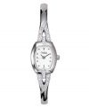 A twist of elegance takes this Caravelle by Bulova timepiece to the next level of style. Mixed metal bangle bracelet with crystal detailing and mixed metal case. Crystal-accented bezel. White dial with logo and circle markers. Quartz movement. Water resistant to 30 meters. Two-year limited warranty.