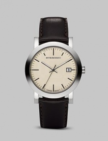 A sophisticated design crafted in Switzerland with a signature check detail and rich leather band. Quartz movement Water-resistant to 5 ATM/50m Solid stainless steel case Textured check dial Leather band Second hand Date display Round case, 38mm, 1.5 Band width, 24mm, 0.94 Made in Switzerland A sophisticated design crafted in Switzerland with a signature check detail and rich leather band. Quartz movement Water-resistant to 5 ATM/50m Solid stainless steel case Textured check dial Leather band Second hand Date display Round case, 38mm, 1.5 Band width, 24mm, 0.94 Made in Switzerland