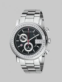 From the G Chrono Collection. Fifty-four diamonds spell out the signature G, sparkling against the black guilloché chronograph dial. 54 diamonds, 0.78 tcw Steel case and bracelet Sapphire crystal Day/date window Chronograph stopwatch dials Water-resistant to 3ATM ETA Swiss quartz movement Made in Switzerland