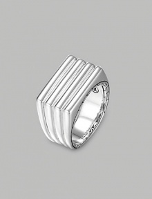 A ridged band of fine silver is finished with etched deisgns on the sides and inside of the band. From the Bedeg Collection Silver 0.52 wide Imported 