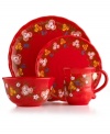 Very crafty. The bold red Pasha place setting appeals with a homespun look and feel in organically shaped, artfully hand-painted earthenware from Tabletops Unlimited. With a secret design on the base of each piece.