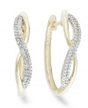 Up your glam factor. Yell'Ora's chic spiraling hoop earrings showcase round-cut diamonds front and center (1/3 ct. t.w.). Base metal made from a combination of pure gold, sterling silver and palladium. Approximate diameter: 3/4 inch.