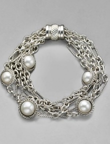 Pearls from the deep are captured in a cabled settings tangled in a netting of sterling chains. Mixed link bracelet 7½ long Cable barrel clasp Imported Pearls from the deep are captured in a cabled settings tangled in a netting of sterling chains. Mixed link bracelet 7½ long Cable barrel clasp Imported
