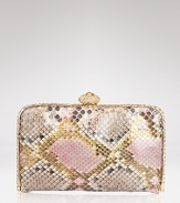 Embrace your exotic instincts with this genuine python clutch from Clara Kasavina. With a Swarovski crystal embellished frame, this ultraluxe bag is the perfect partner for your finest jewels.