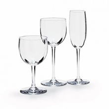 Pure, design is accented by an optic effect, with fluting on the interior of an outwardly smooth bowl which casts intriguing reflections on a table. Shown left to right: Montaigne low water goblet, Montaigne tall red wine goblet and Montaigne flute. Also available: Montaigne large goblet. Pure, design is accented by an optic effect, with fluting on the interior of an outwardly smooth bowl which casts intriguing reflections on a table. Shown left to right: Montaigne low water goblet, Montaigne tall red wine goblet and Montaigne flute. Also available: Montaigne large goblet.