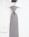 A dog-newspaper print adds a playful touch to this signature Salvatore Ferragamo silk tie.SilkDry cleanMade in Italy