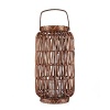 Bring the outside in! Woodsy and inviting, this lantern adds rustic chic to patios or terraces.