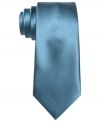 Make a singular statement. This Bar III skinny tie brightens up any monochromatic look.