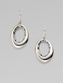 From the Kali Collection. A free-formed, open oval with a pebbled interior in sleek sterling silver. Sterling silverLength, about 1½French wire backImported 