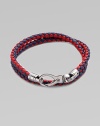 A boldly hued braided leather bracelet perfect for layering and wrap around styling.LeatherAbout 3 diam.Spring claspMade in Italy