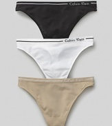Calvin Klein Underwear seamless thong. A comfortable seamless thong with logo and stripe detail on waistband. Cotton gusset.