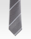 A signature tie handmade from fine Italian silk with diagonal stripes and subtle GG detail. Silk Dry clean Made in Italy 
