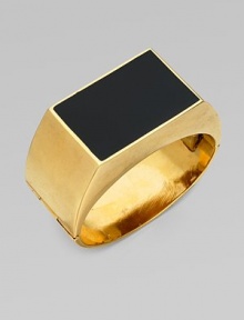 A statement piece with a glossy enamel embellishment. BrassEnamel Diameter, about 2Hinged push clasp closureMade in Italy A statement piece with a glossy enamel embellishment. BrassEnamel Diameter, about 2Hinged push clasp closureMade in Italy
