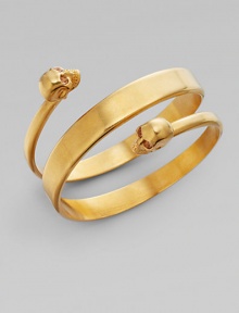 Edgy yet understated, this wrap cuff boasts twin skulls with crystal eyes.Crystal Brass Diameter, 2½ Width, 1¾ Made in Italy Edgy yet understated, this wrap cuff boasts twin skulls with crystal eyes.Crystal Brass Diameter, 2½ Width, 1¾ Made in Italy