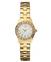 Powerful sparkle in a petite package: a gold tone watch from GUESS.