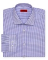 Power up your office attire with a handsome dress shirt from HUGO, featuring a light color palette and a modern fit.