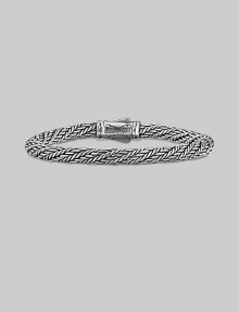 From the Kodiak Collection. A handsome, hand-woven herringbone braid of sterling silver with a bold carved clasp.6mm sterling silver braid Length, about 8½ Lobster clasp Made in USA From the Kodiak Collection. A handsome, hand-woven herringbone braid of sterling silver with a bold carved clasp.6mm sterling silver braid Length, about 8½ Lobster clasp Made in USA