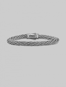 From the Kodiak Collection. A handsome, hand-woven herringbone braid of sterling silver with a bold carved clasp.6mm sterling silver braid Length, about 8½ Lobster clasp Made in USA