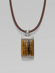 A stunning dogtag pendant is designed in fine silver with basketwoven tiger's eye and quartz detail on a leather cord necklace. From the Bedeg Collection Silver Tiger's eye Quartz, 0.56 tcw Leather Pendant, 1W X 2¼H Necklace, adjustable 18-20 Lobster clasp Imported A stunning dogtag pendant is designed in fine silver with basketwoven tiger's eye and quartz detail on a leather cord necklace. From the Bedeg Collection Silver Tiger's eye Quartz, 0.56 tcw Leather Pendant, 1W X 2¼H Necklace, adjustable 18-20 Lobster clasp Imported