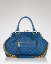 Classic and crave-inducing, Marc Jacob's quilted satchel is a luxe essential for style-setters of any generation.