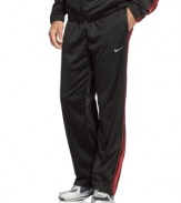 Dress the part of a pro athlete when you suit up in the ultra-smooth performance style of these Dri-Fit track pants from Nike.