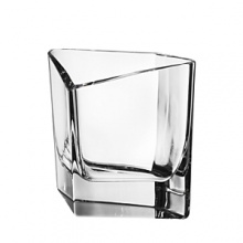 Carefully crafted with four gently rounded corners, this enchantingly sculptural vase refreshes your décor with a uniquely modern shape that elevates your flower presentations. Carefully crafted with four gently rounded corners, this enchantingly sculptural vase refreshes your décor with a uniquely modern shape that elevates your flower presentations.