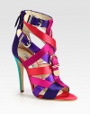 Electrified multicolored satin design with goldtone buckle straps and a sky-high heel. Self-covered heel, 4½ (115mm)Satin upperBack zipAdjustable buckle strapsLeather lining and solePadded insoleMade in Italy