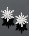 Step into a winter wonderland with these sparkling snowflake earrings featuring round-cut diamond (3/8 ct. t.w.) in 14k white gold.