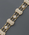 A bracelet built for a goddess, this clever design features a 14k gold setting with round-cut diamond (1 ct. t.w.). Approximate length: 7-1/2 inches.