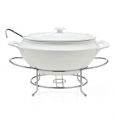 At once elegant and utilitarian, the Cucina soup tureen transitions flawlessly from oven to table and will keep your food piping hot, set in a silvertone metal rack. A must for the consummate host, from Godinger.