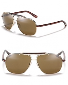 Tom Ford's new take on the iconic aviator featuring a statement-making double bar design. Tom Ford's new take on the iconic aviator featuring a statement-making double bar design.