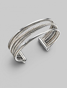 From the Silver Ice Crossover Collection. Crisscross rows of sterling silver and white gold - some smooth, some twisted, some paved with diamonds - create a shining look in this open strand cuff. Diamonds, 0.75 tcw Sterling silver & 14k white gold Cable, 3mm Diameter, about 2½ Width, about ¾ Made in USA From the Silver Ice Crossover Collection. Crisscross rows of sterling silver and white gold - some smooth, some twisted, some paved with diamonds - create a shining look in this open strand cuff. Diamonds, 0.75 tcw Sterling silver & 14k white gold Cable, 3mm Diameter, about 2½ Width, about ¾ Made in USA