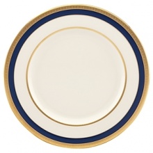 Inspired by privately commissioned presidential dinnerware, this fine china features stately navy bands and a gold border etched with patriotic stars. Inspired by privately commissioned presidential dinnerware, this fine china features stately navy bands and a gold border etched with patriotic stars.
