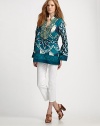 An exotic design complete with a vibrant print and a stylized collar and neckline. Embellished v-neckLong sleevesPull-on styleAbout 32 from shoulder to hemSilkDry cleanImported Model shown is 5'10 (177cm) wearing US size 4. 