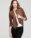 Perforated details lend sporty cool to this BCBGMAXAZRIA jacket, cut in a hyper-modern asymmetrical silhouette.