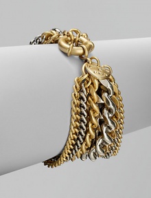 A wide, chunky style in a modern, two-tone design. Brass and silver oxide plated brassSpring ring closureLength, about 7½Imported A wide, chunky style in a modern, two-tone design. Brass and silver oxide plated brassSpring ring closureLength, about 7½Imported
