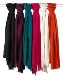 Whether it's wrapped around your shoulders or tied at the neck, this versatile wrap is a must-have for the chilly season. Whether it's wrapped around your shoulders or tied at the neck, this versatile wrap is a must-have for the chilly season.